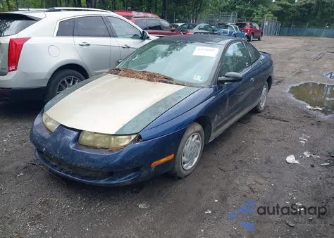 1999 Saturn Sc1 z USA, uszkodzony, nr VIN 1G8ZP1284XZ348752